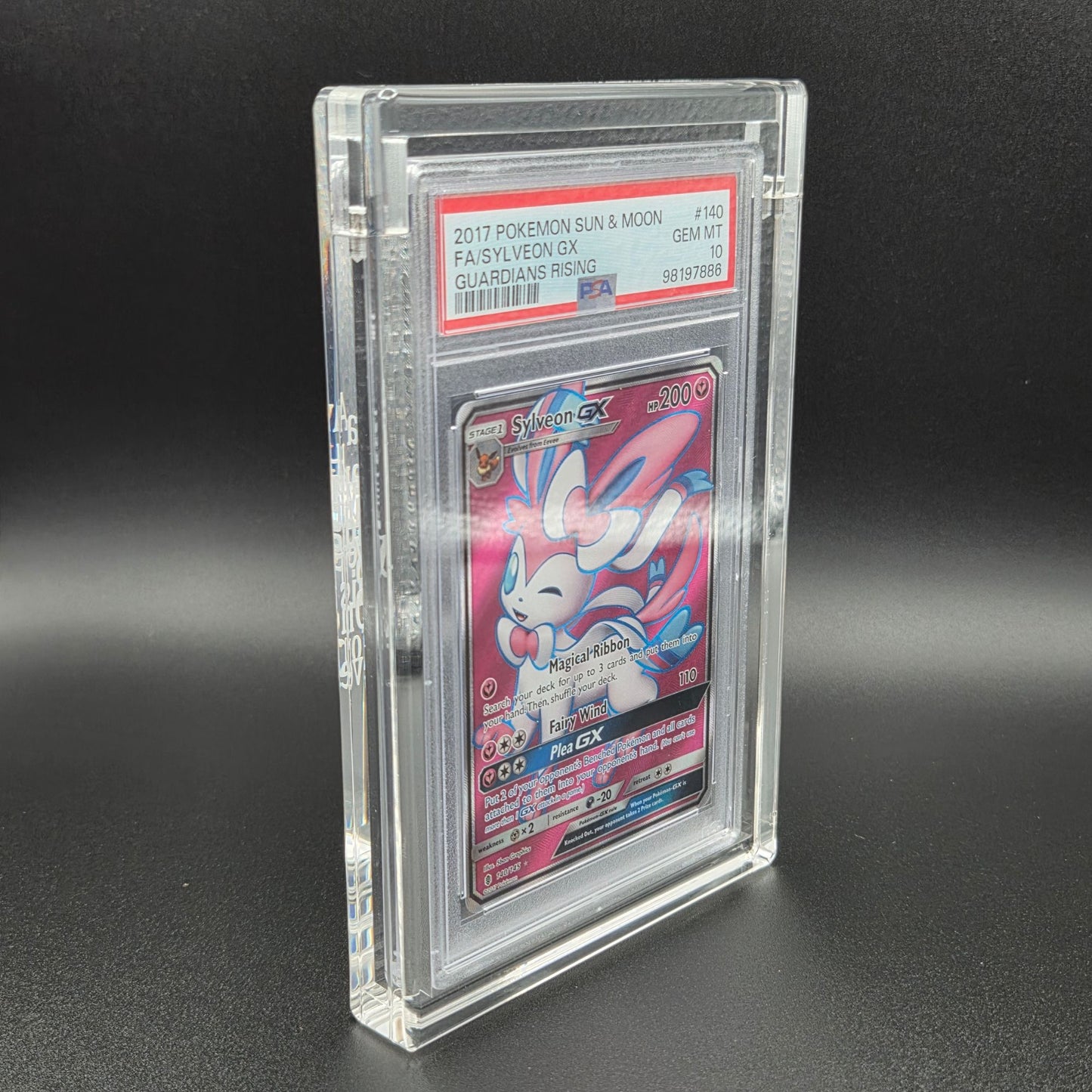 Pokémon trading card in a clear protective case on a dark background