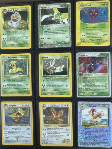 vintage Pokemon card binder page featuring Dark Arbok, Scyther ex, Crobat ex, and other holographic cards